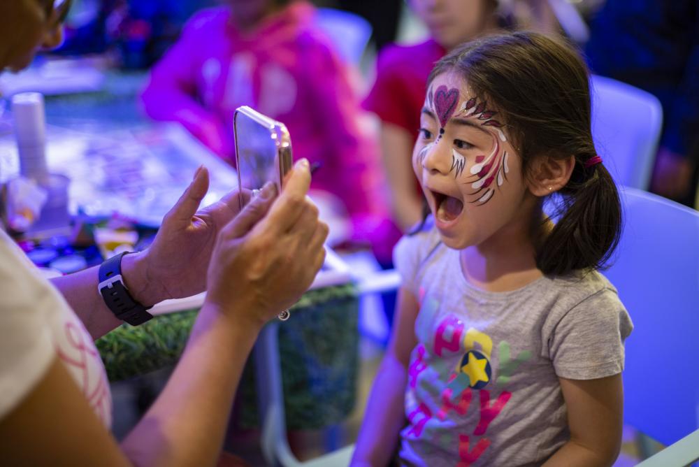 Sibling at Eid al Fitr party at GOSH 